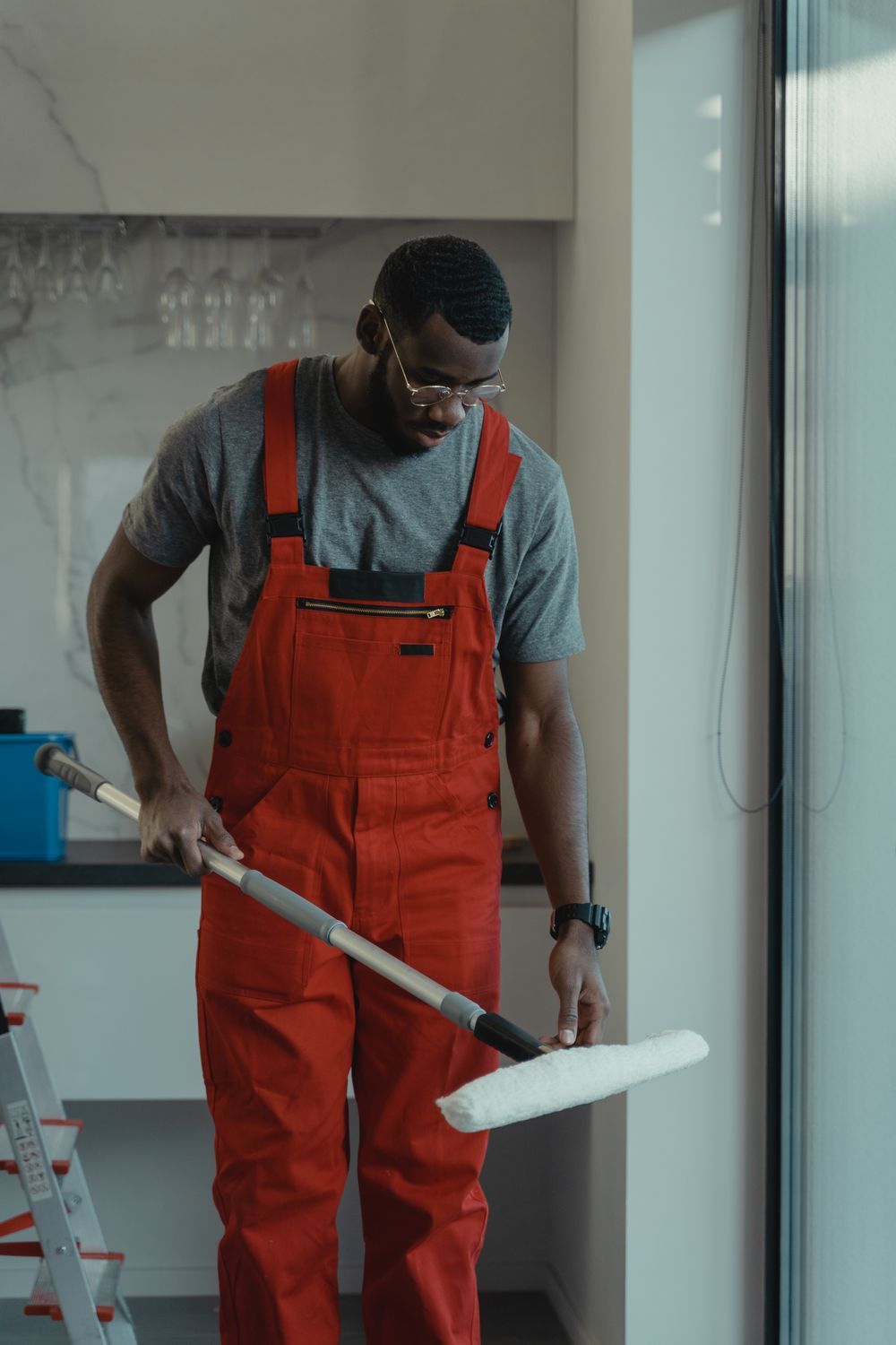 Landmark cleaning professional mopping an office floor